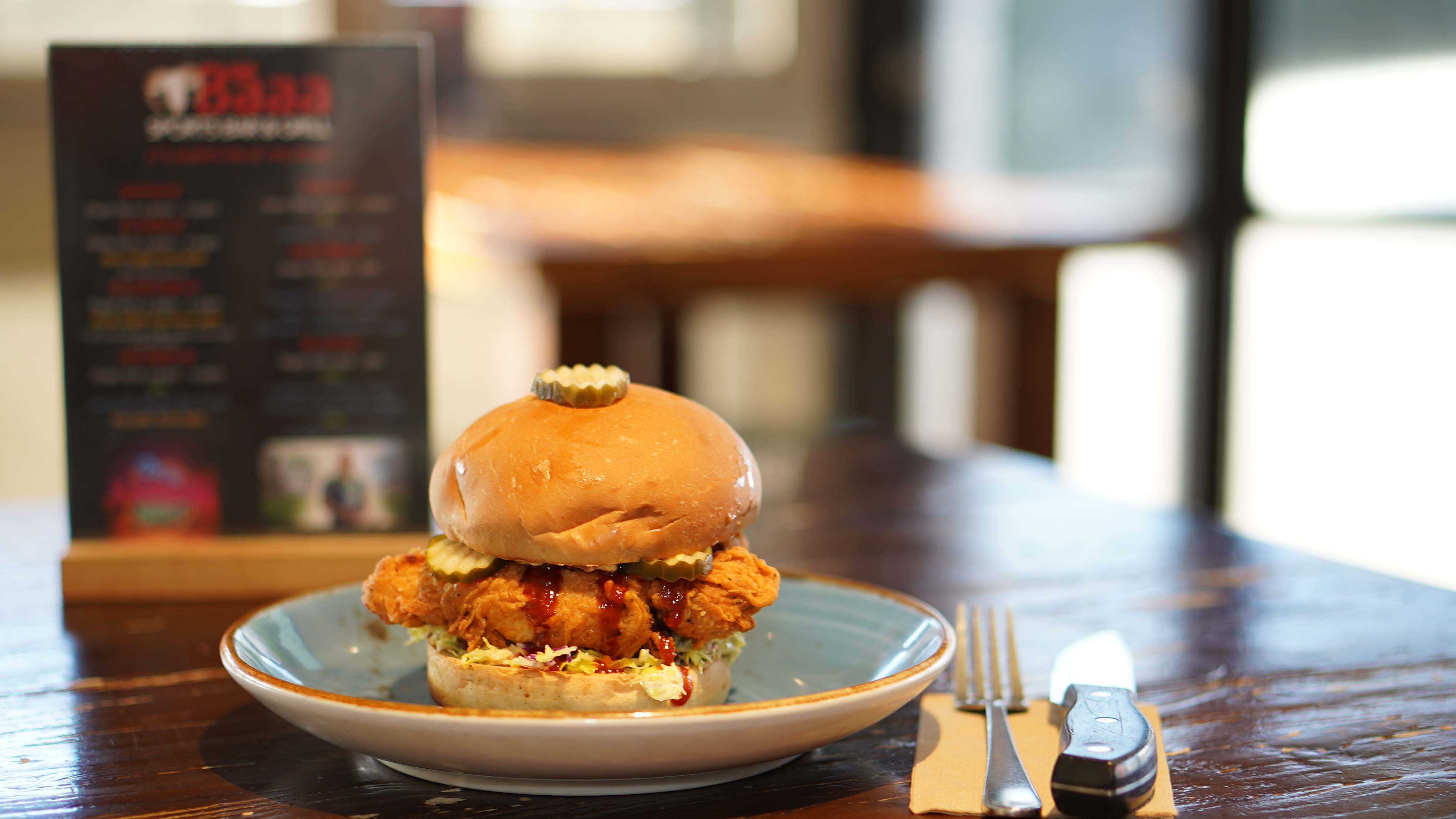 A bacon cheeseburger served at The Baaa